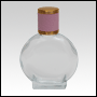 Circle Shaped Clear Glass Bottle with Pink Leather-type cap. Capacity: 52 ml (about 2oz) at neck.
