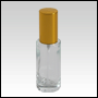 Clear Glass Bottle. Tall, Cylindrical with a Gold Sprayer and Cap. Capacity:1 oz (30ml) 