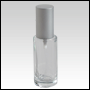 Clear Glass Bottle. Tall, Cylindrical with a Matte Silver Sprayer and Cap. Capacity:1 oz (30ml) 