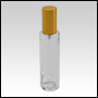 Clear Glass Bottle. Tall, Cylindrical with a Gold Sprayer and Cap. Capacity:1 2/3 oz (50ml) 