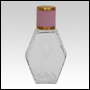 Clear glass Diamond-shaped bottle with Pink Leather-type cap. Capacity: 63 ml (2 oz) at neck.