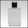 Elegant Clear glass bottle with Black Leather-type cap. Capacity: 102 mL (~3.45 