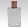 Elegant Clear glass bottle with Pink Leather-type cap. Capacity: 102 mL (~3.45 