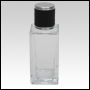 Empire Clear glass bottle with Black Leather-type cap. Capacity: 56 mL (about 2oz) at neck. 