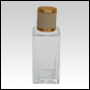 Empire Clear glass bottle with Ivory Leather-type cap. Capacity: 56 mL (about 2oz) at neck. 