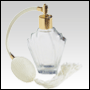  **OUT OF STOCK*Flair glass bottle with Ivory Bulb sprayer, tassel and golden fitting. Capacity: 2oz