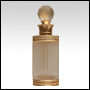 Royal cylindrical shaped perfume bottle with golden metal decoration. Capacity : Approx 14ml (1/2oz)
