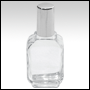 Rectangular glass bottle w/Silver cap.  Capacity: 1oz (28ml)