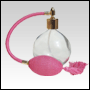 Clear Round glass bottle with Pink Bulb sprayer, tassel and golden fitting. Capacity: 4.33oz(128ml)