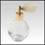 Round glass bottle with Ivory Bulb sprayer and golden fitting. Capacity: 2 2/3oz (