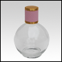 Clear Round glass bottle with Pink Leather-type cap. Capacity: 125 mL (about 4oz) at neck.   