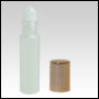 Frosted glass Roll on bottle with Golden color metallized cap.  Capacity : 9ml (1/3oz