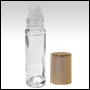 Clear glass roll on bottle with Gold color metalized cap. Capacity: 9ml (1/3oz)