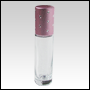 Clear roll-on bottle with pink cap.Pink Cap with silver dots.  Capacity: 9 ml (1/3 oz)