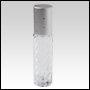 Clear glass swirl design roll on bottle with silver cap. Silver cap with silver dots.  Capacity: 9 m