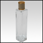 Sleek clear glass bottle with Ivory Leather-type cap. Capacity:109 mL  (~3.68 oz)