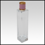 Sleek clear glass bottle with Pink Leather-type cap. Capacity: 109 mL  (~3.68 oz)