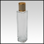 Slim clear glass tall bottle with Ivory Leather-type cap. Capacity: Up to 103 mL  