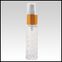 Clear swirl glass, refillable bottle with golden metal collar sprayer. 10ml (1/3oz)
