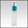 Clear swirl glass, refillable bottle w/Turquoise Blue metal collar sprayer. 10ml (1/3 oz)