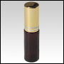 Amber Glass, refillable, cylindrical bottle with Silver-ringed Gold metal sprayer