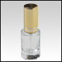 Clear Tulip shaped bottle with Silver-ringed Gold Sprayer. Capacity: 5 ml (1/6 oz)