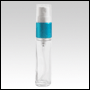 Clear glass, refillable bottle w/Turquoise Blue metal collar sprayer. Capacity : 9ml (1/3oz)