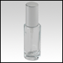 Cylindrical clear glass tall bottle with Shiny Silver treatment pump and cap. Capacity: 30 ml (1 oz)