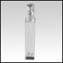 Sleek clear glass bottle with Matte Silver treatment pump and clear Over Cap. 54 mL (~2oz) at neck. 